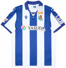 Camisa Macron Real Sociedad I 2024/25 - Azul e Branco